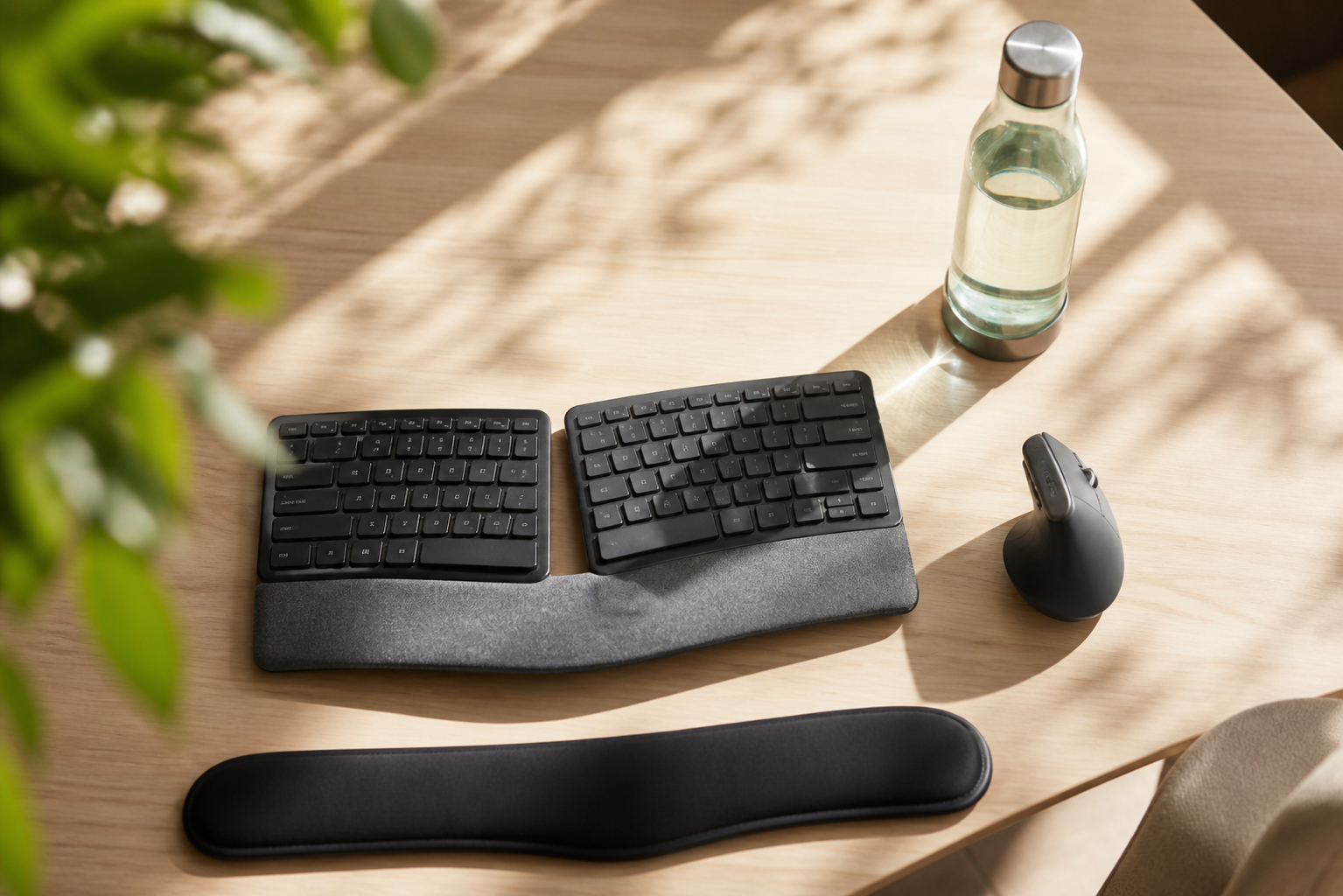 Ergonomic home office desk with keyboard, vertical mouse, and wrist rest